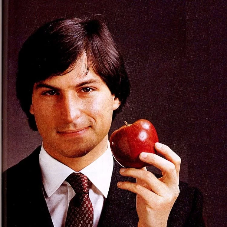 Steve Jobs with an Apple