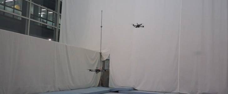 Watch quadrocopters throw a stick and balance it on their heads