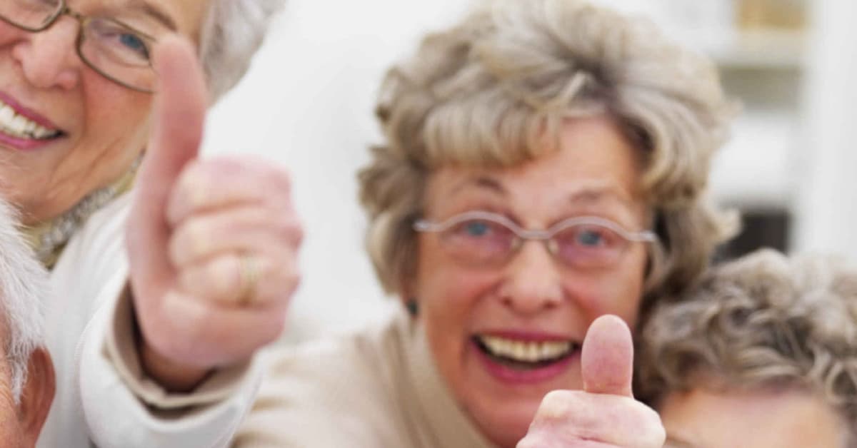 Success - Older people giving thumbs up