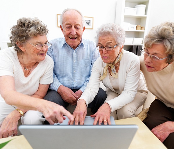 elderly people on computer