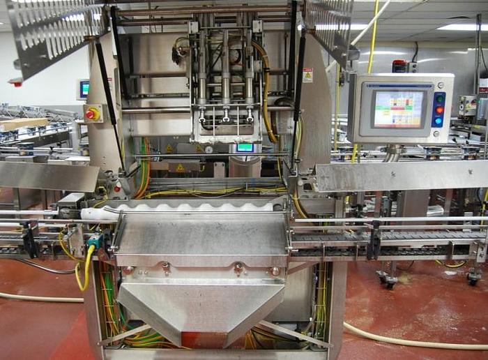 Massive chicken de-boning machine pulls 1500 breasts per hour