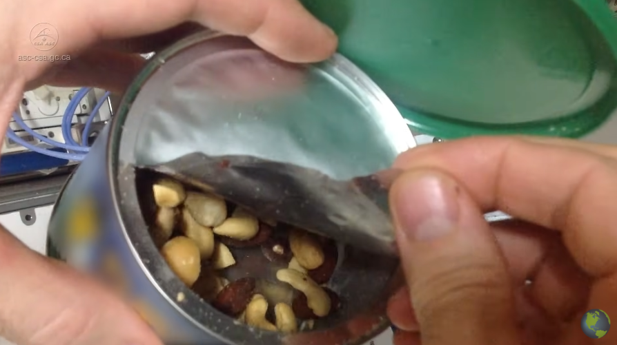 In space, nuts in a can might freak you out