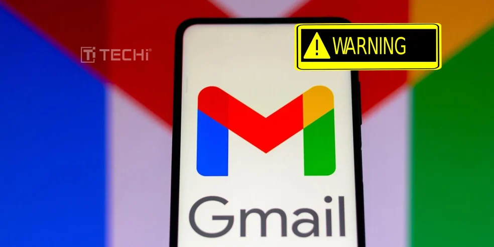 Gmail logo on a phone with a warning sign overlaid, signaling a security alert for users.