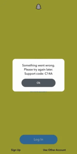 Snapchat Outage Stokes 'Internet Crisis' Fears as 'C14A' Error Spreads 2 A screenshot of the Snapchat login screen displaying an error message saying, "Something went wrong. Please try again later. Support code: C14A." The error message has an "OK" button and options to "Sign Up" or "Use Other Account" at the bottom.