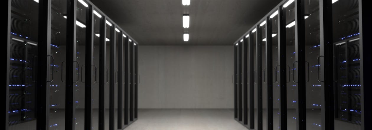 Server room with rows of data center racks representing Alphabet Google Cloud AI infrastructure